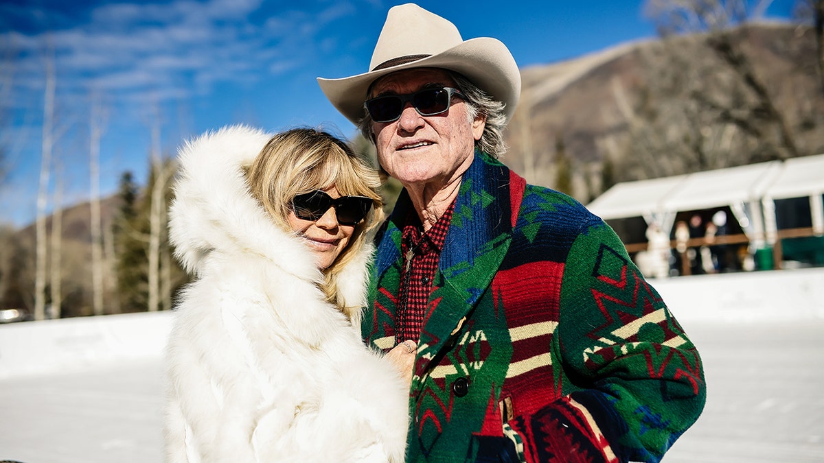 Goldie Hawn and Kurt Russell standing together at Rio Grande Park in Aspen, Colorado