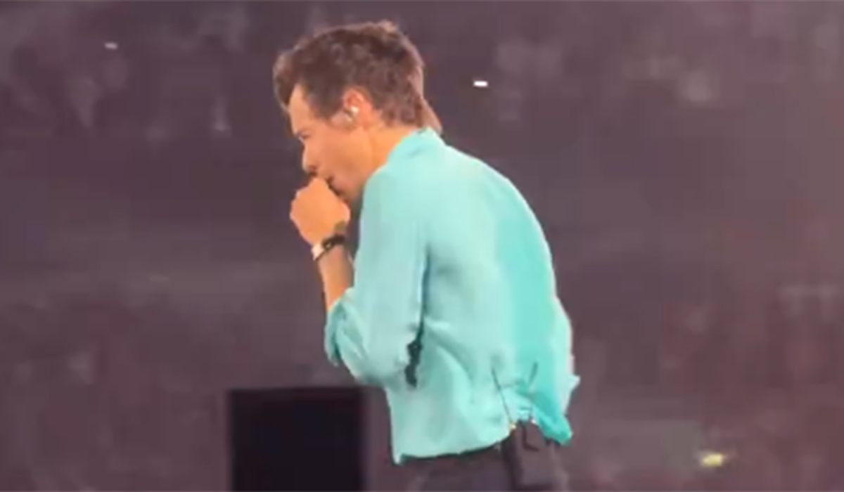 Harry Styles collapses to the ground during Wembley gig