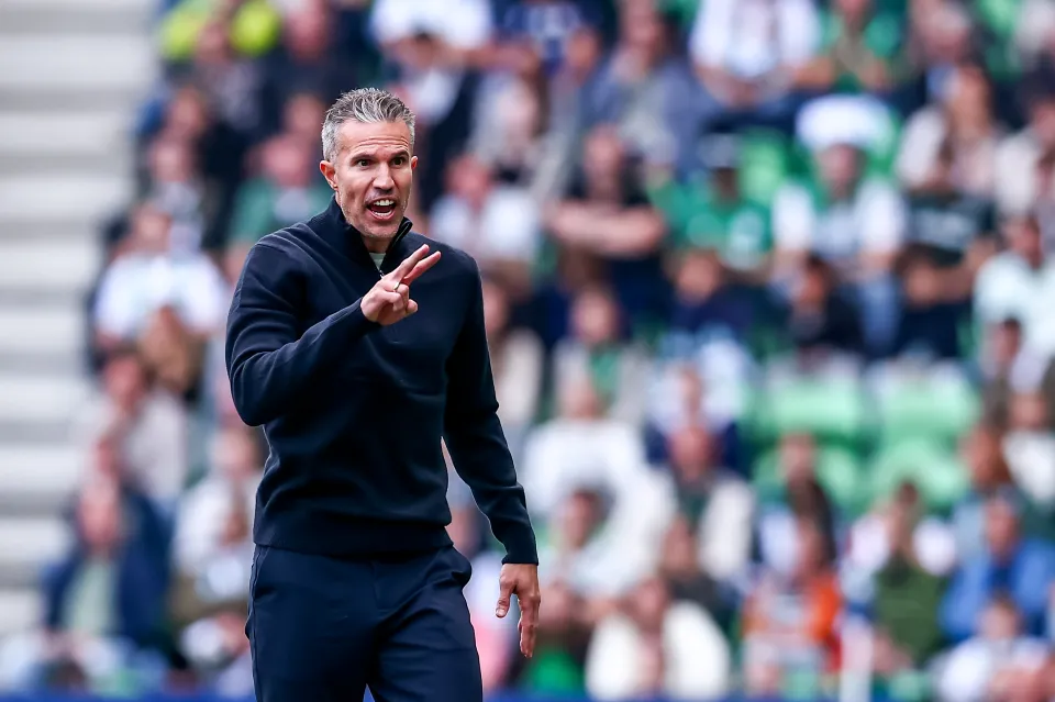 Robin van Persie of Feyenoord reacts to the bench of FC Groningen during the Dutch Eredivisie match between FC Groningen and Feyenoord