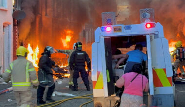Bus set alight and buildings evacuated in Belfast as anti-immigration protests continue