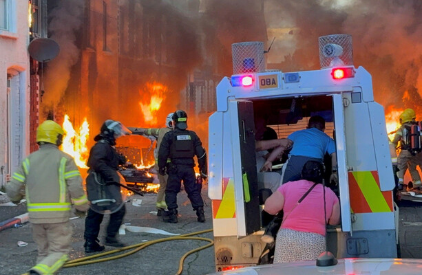 Bus set alight and buildings evacuated in Belfast as anti-immigration protests continue