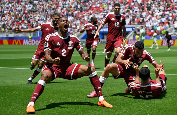 Qatar captain heads 94th-minute equaliser to earn country's first World Cup point