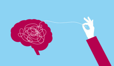 Hand pulling a thread from the brain to clear mental confusion and clarify thoughts