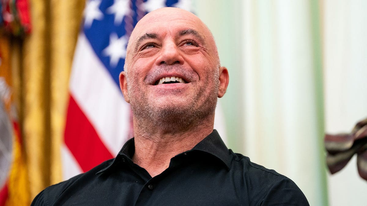 Joe Rogan standing in the Oval Office of the White House in Washington, D.C.