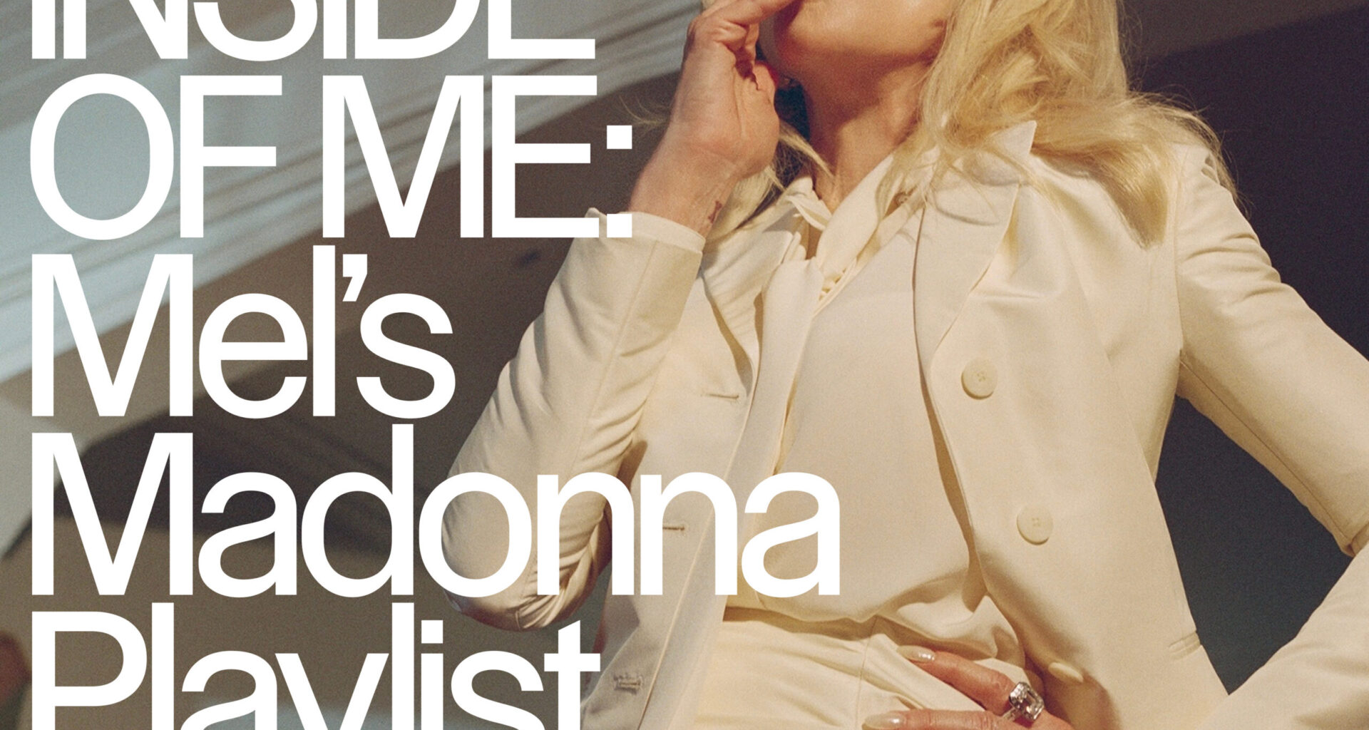 Madonna smoking a cigarette in a white pantsuit with the words "INSIDE OF ME: Mel