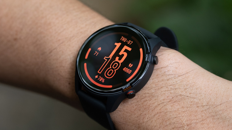 a smartwatch with gorilla glass on someone's wrist