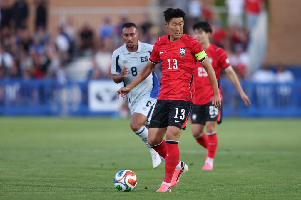 Republic of Korea forward Son Heung-Min (13) looks to pass against El Salvador.