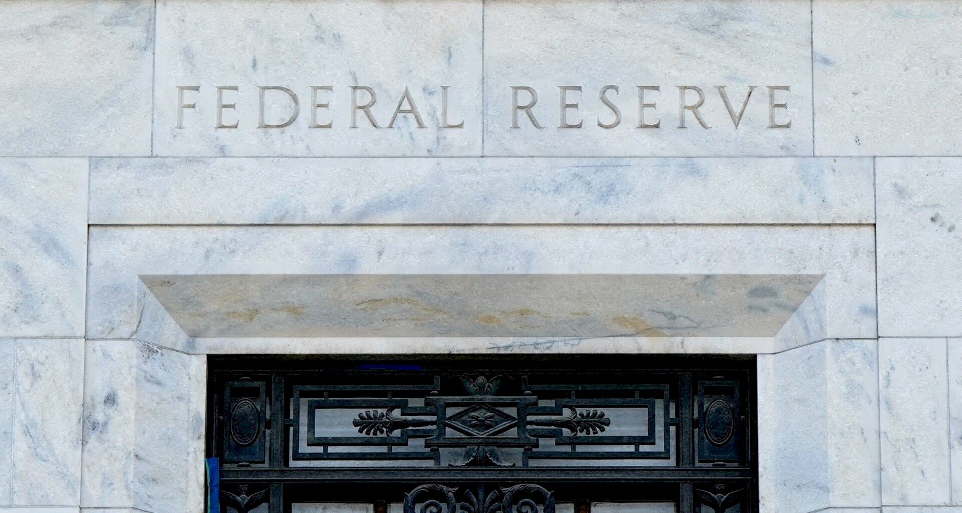 US Federal Reserve holds rates steady under new chair Warsh | Inflation News