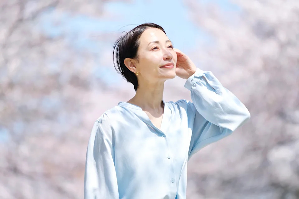 woman walking outdoors feeling calm, reflecting that anxiety is common and treatable with professional help