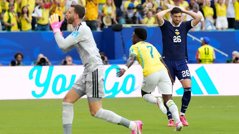 Vinicius Junior wheels away in celebration after giving Brazil an early lead (AP Photo/Rebecca Blackwell)