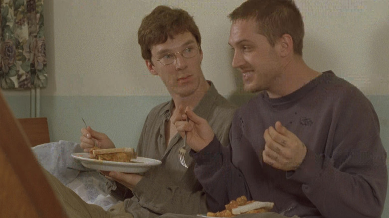 Benedict Cumberbatch's Alexander Masters sits looking at Tom Hardy's Stuart Clive Shorter in Stuart A Life Backwards