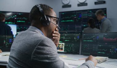 Person looking at multiple monitors.
