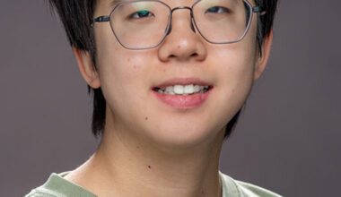 Portrait of Christina Wang, a postdoctoral researcher and Lederman Fellow at Fermi National Accelerator Laboratory, who has been awarded the American Physical Society’s 2026 Mitsuyoshi Tanaka Award in Experimental Particle Physics for her pioneering work in particle detection.