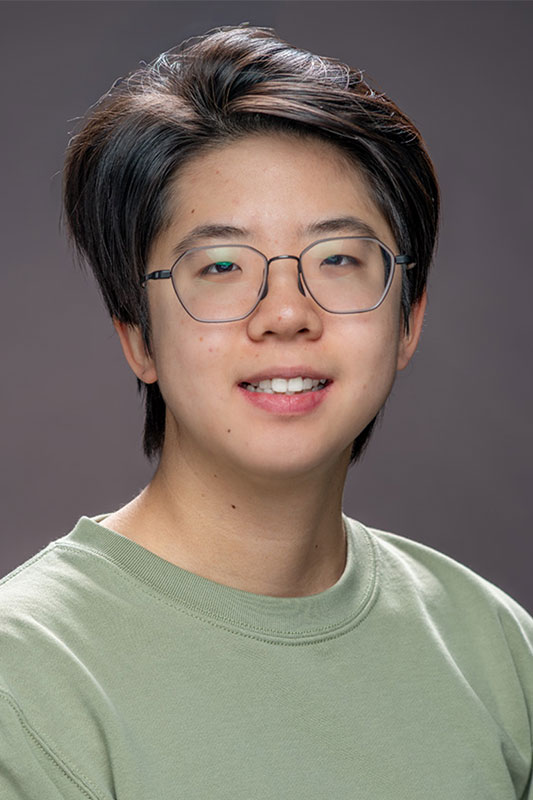 Portrait of Christina Wang, a postdoctoral researcher and Lederman Fellow at Fermi National Accelerator Laboratory, who has been awarded the American Physical Society’s 2026 Mitsuyoshi Tanaka Award in Experimental Particle Physics for her pioneering work in particle detection.