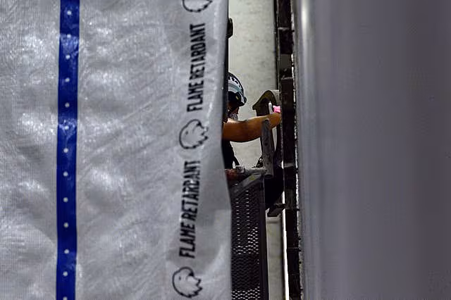 A worker removes a letter 