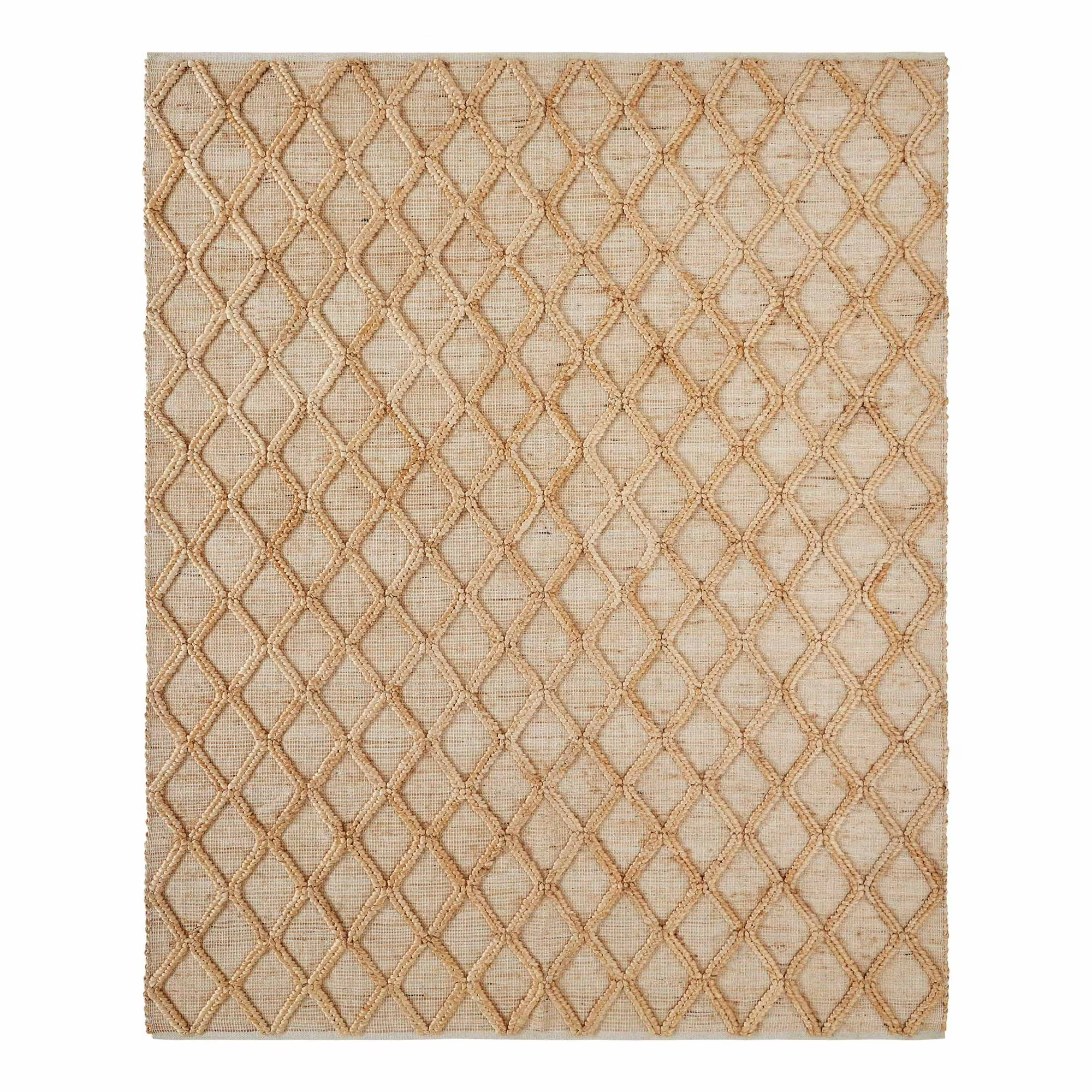 a jute rug with an elevated trellis pattern