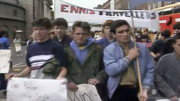 People marching and holding signs