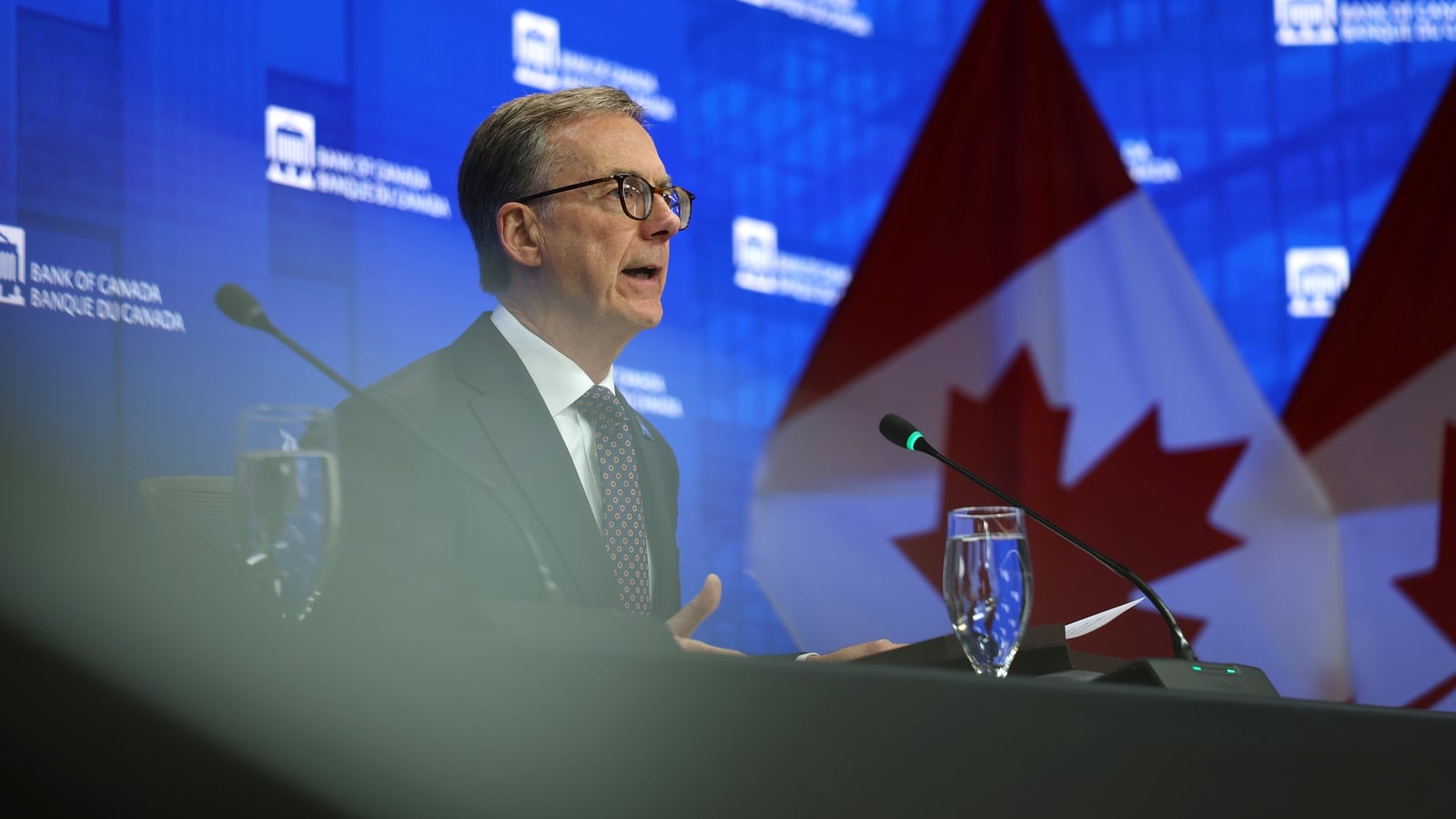 Bank of Canada holds rates, sees economic growth in H2
