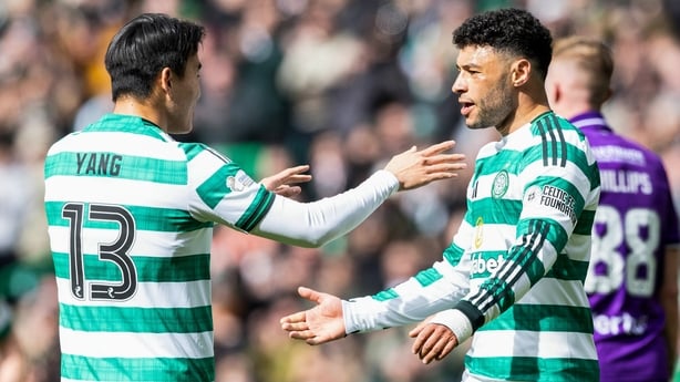 Celtic's Alex Oxlade-Chamberlain, right, celebrates with team-mate Yang Hyun-jun after his goal against St Mirren