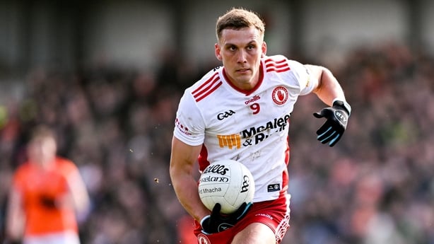 12 April 2026; Conn Kilpatrick of Tyrone in action against Peter McGrane of Armagh during the Ulster GAA Football Senior Championship Preliminary Round match between Armagh and Tyrone at BOX-IT Athletic Grounds in Armagh. Photo by Ramsey Cardy/Sportsfile