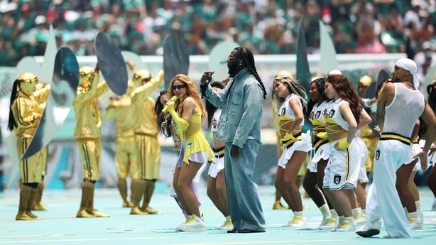 MEXICO CITY, MEXICO - JUNE 11: Burna Boy and Shakira perform during the Opening Ceremony before the FIFA World Cup 2026 Group A match between Mexico and South Africa at Mexico City Stadium on June 11, 2026 in Mexico City, Mexico. (Photo by Hector Vivas - FIFA/FIFA via Getty Images)