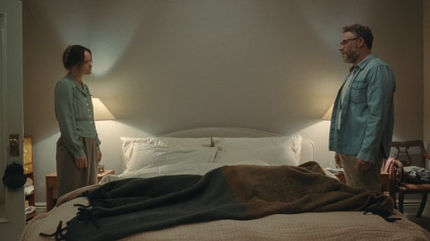 Olivia Wilde as Angela and Seth Rogen as Joe argue in the bedroom in The Invite