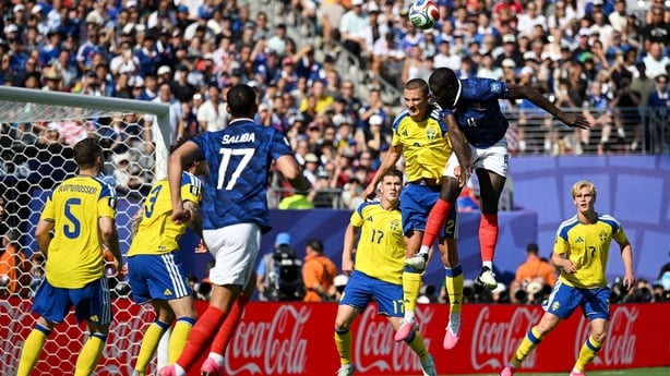 EAST RUTHERFORD, NEW JERSEY - JUNE 30: Dayot Upamecano #4 of France competes for a header against Gustaf Lagerbielke #2 of Sweden during the FIFA World Cup 2026 Round Of 32 match between France and Sweden at New York New Jersey Stadium on June 30, 2026 in East Rutherford, New Jersey. (Photo by Shaun