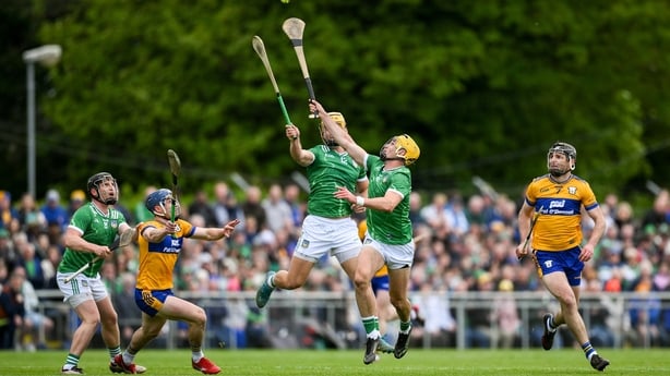 3 May 2026; Cathal O'Neill of Limerick gathers possession ahead of teammate Tom Morrissey during the Munster GAA Senior Hurling Championship Round 3 match between Clare and Limerick at Zimmer Biomet Páirc Chíosóg in Ennis, Clare. Photo by Brendan Moran/Sportsfile