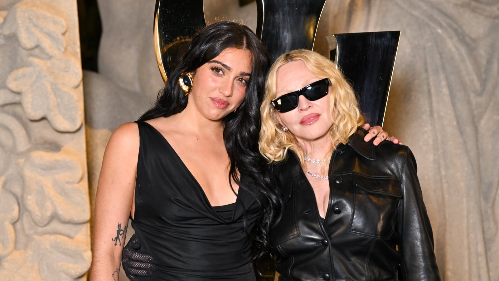 Madonna sings about perils of fame in duet with daughter