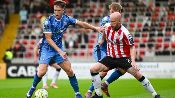 3 July 2026; Sam Glenfield of Waterford in action against Liam Boyce of Derry City during the SSE Airtricity Men's Premier Division match between Derry City and Waterford at The Ryan McBride Brandywell Stadium in Derry. Photo by Shauna Clinton/Sportsfile