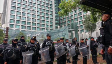 Riot police guard England team hotel in Mexico City