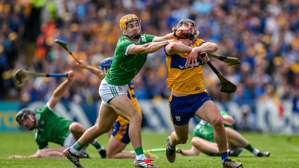 3 May 2026; Diarmuid Stritch of Clare is tackled by Adam English of Limerick, resulting in a second yellow card, and subsequently a red card for Adam English, during the Munster GAA Senior Hurling Championship Round 3 match between Clare and Limerick at Zimmer Biomet Páirc Chíosóg in Ennis, Clare. P