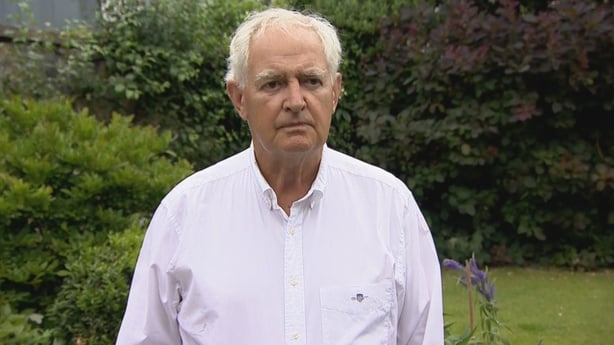 Dr Peter Boylan stands outside.