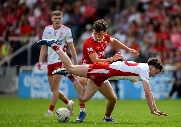 Logan O'Connor of Tyrone in action against Conor Downing of Cork during the Electric Ireland All-Ireland Minor Football Championship final match between Tyrone and Cork at Cedral St Conleth's Park in Newbridge, Kildare