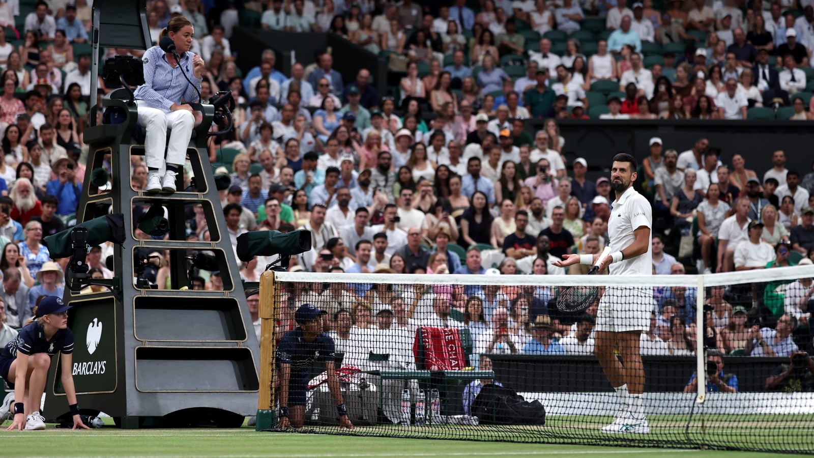 Ref row can't derail Djokovic on Wimbledon's longest day