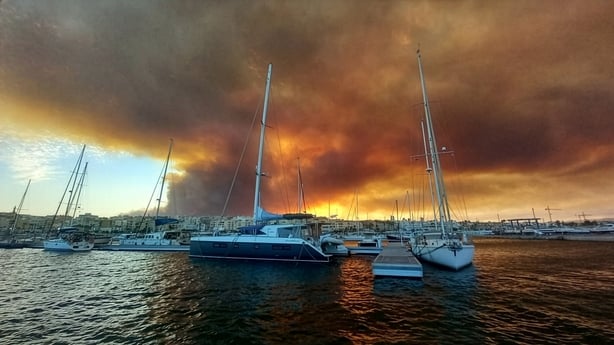 A wildfire rages at a port in Andalusia, Spain .