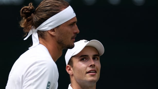 Germany's Alexander Zverev (L) and Britain's Arthur Fery pose together prior to their men's singles semi-final tennis match on the twelfth day of the 2026 Wimbledon Championships at The All England Lawn Tennis and Croquet Club in Wimbledon, southwest London, on July 10, 2026. 