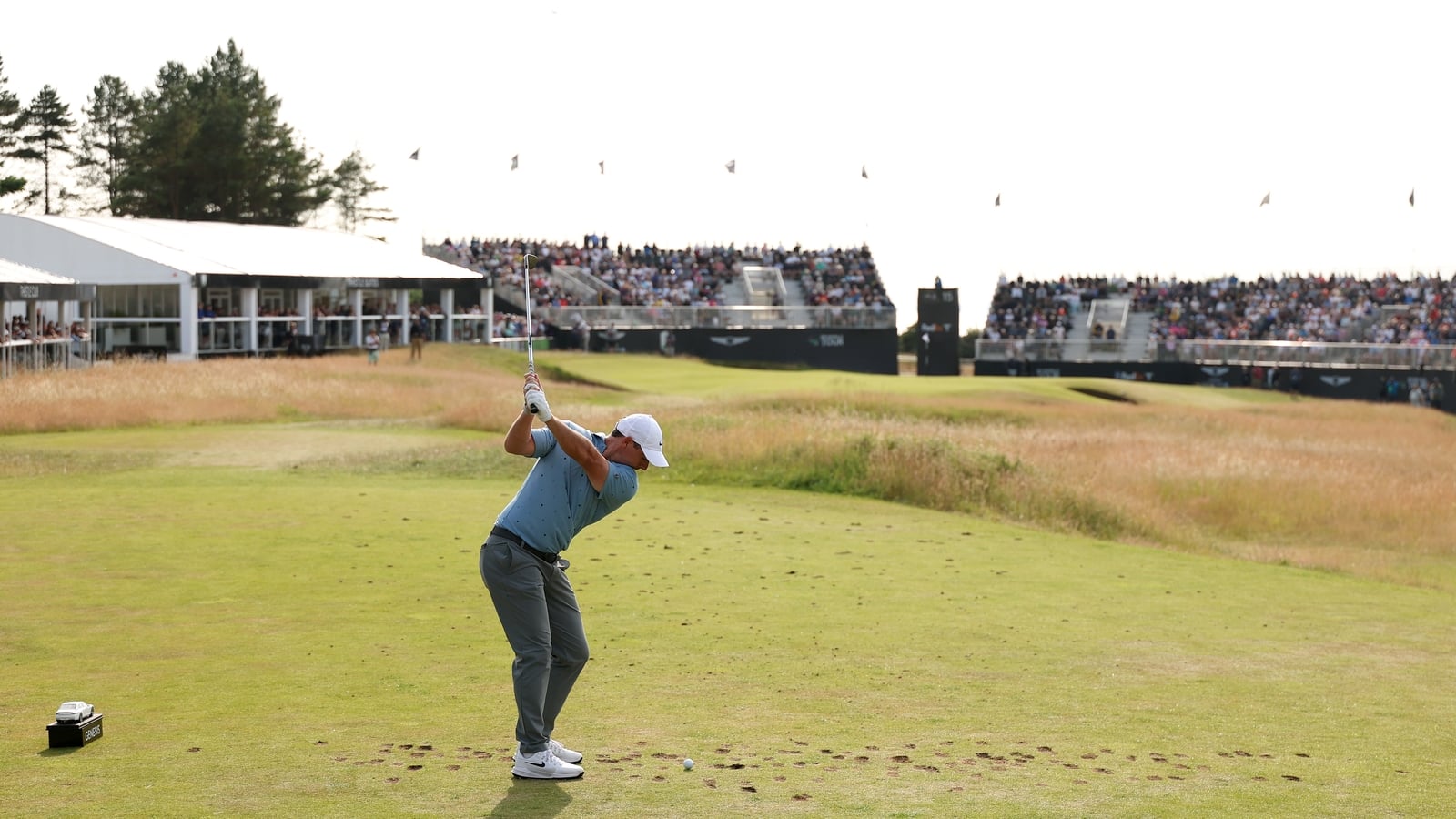 'Excited' McIlroy eases into share of Scottish Open lead