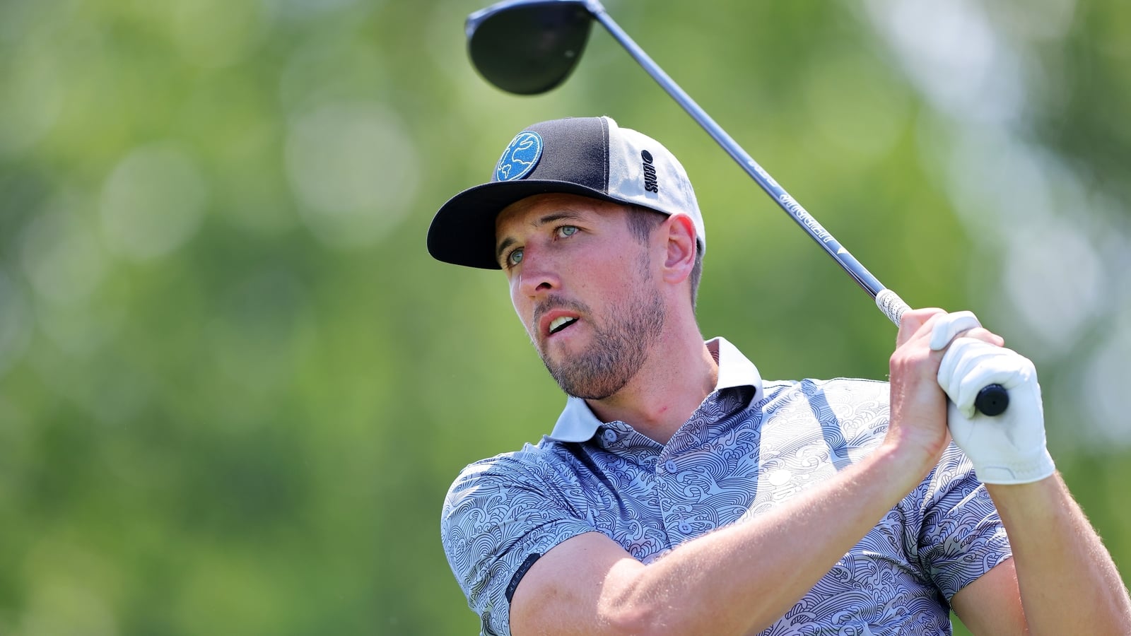 Kane says playing golf with Trump was "surreal"