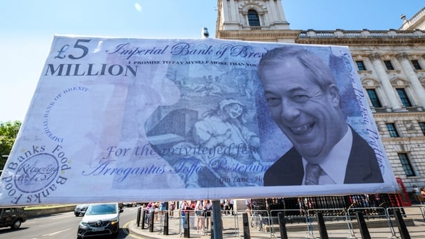 Protesters opposite the Houses of Parliament the day after the Nigel Farage resignation