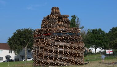 Man dies after falling from Twelfth bonfire in Belfast