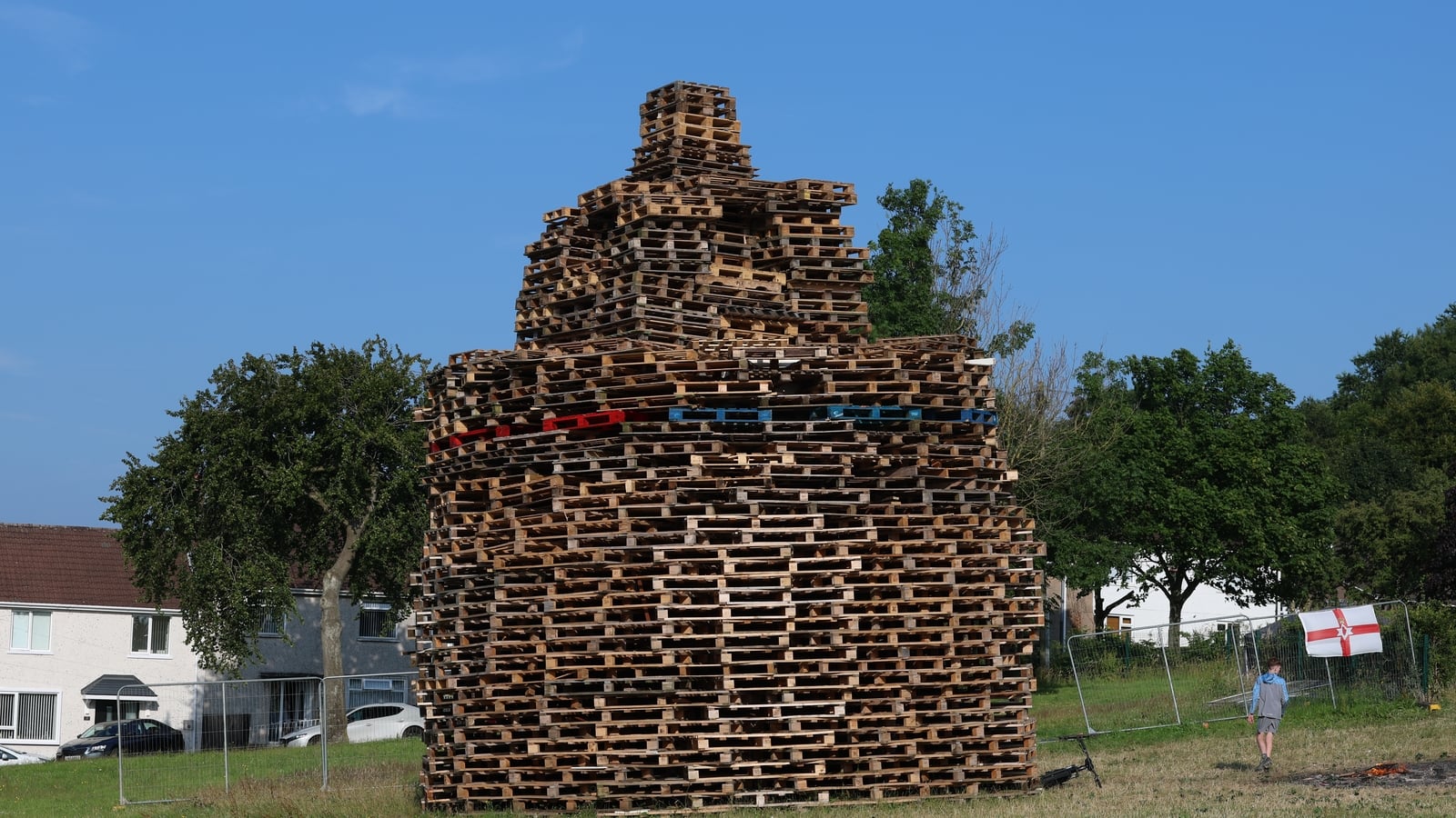 Man dies after falling from Twelfth bonfire in Belfast