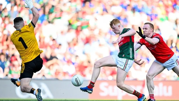 11 July 2026; Darragh Beirne of Mayo scores his side's second goal past Louth goalkeeper Niall McDonnell during the GAA Football All-Ireland Senior Championship semi-final match between Mayo and Louth at Croke Park in Dublin. Photo by Ramsey Cardy/Sportsfile