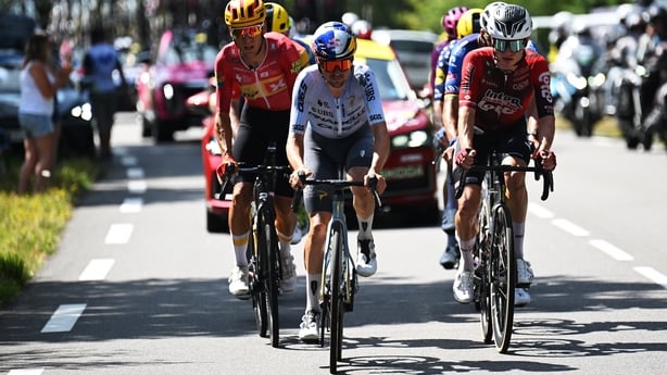 USSEL, FRANCE - JULY 12: (L-R) Tobias Halland Johannessen of Norway and Team Uno-X Mobility, Tom Pidcock of Great Britain and Team Pinarello Q36.5 Pro Cycling and Lennert Van Eetvelt of Belgium and Team Lotto Intermarche compete in the breakaway during the 113th Tour de France 2026, Stage 9 a 155.5k