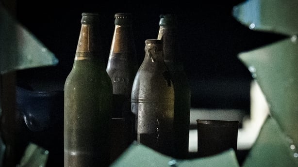 Beer bottles are seen inside the bar after a massive fire broke out in Bangkok, early on July 13, 2026. A fire in a bar in the Thai capital Bangkok killed at least 27 people late Sunday night, Prime Minister Anutin Charnvirakul told local media. (Photo by chanakarn LAOSARAKHAM / AFP)