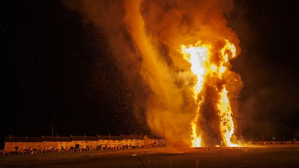 A bonfire burning in Craigyhill, Larne, as part of events to mark the Twelfth of July