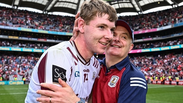 Jason Rabbitte celebrates the All-Ireland SHC semi-final win over Cork with manager Micheál Donoghue
