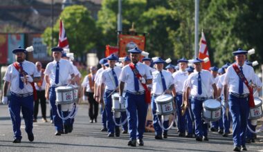 Parade passes former Belfast flashpoint without incident