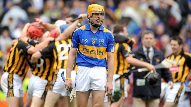 6 September 2009; A dejected Shane McGrath, Tipperary, leaves the pitch as the Kilkenny players celebrate. GAA Hurling All-Ireland Senior Championship Final, Kilkenny v Tipperary, Croke Park, Dublin. Picture credit: Brendan Moran / SPORTSFILE