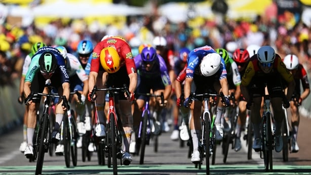 NEVERS, FRANCE - JULY 15: (L-R) Olav Kooij of Netherlands and Decathlon CMA CGM Team, stage winner Soren Waerenskjold of Norway and Team Uno-X Mobility, Jasper Philipsen of Belgium and Team Alpecin-Premier Tech and Milan Fretin of Belgium and Team Cofidis sprint at finish line during the 113th Tour